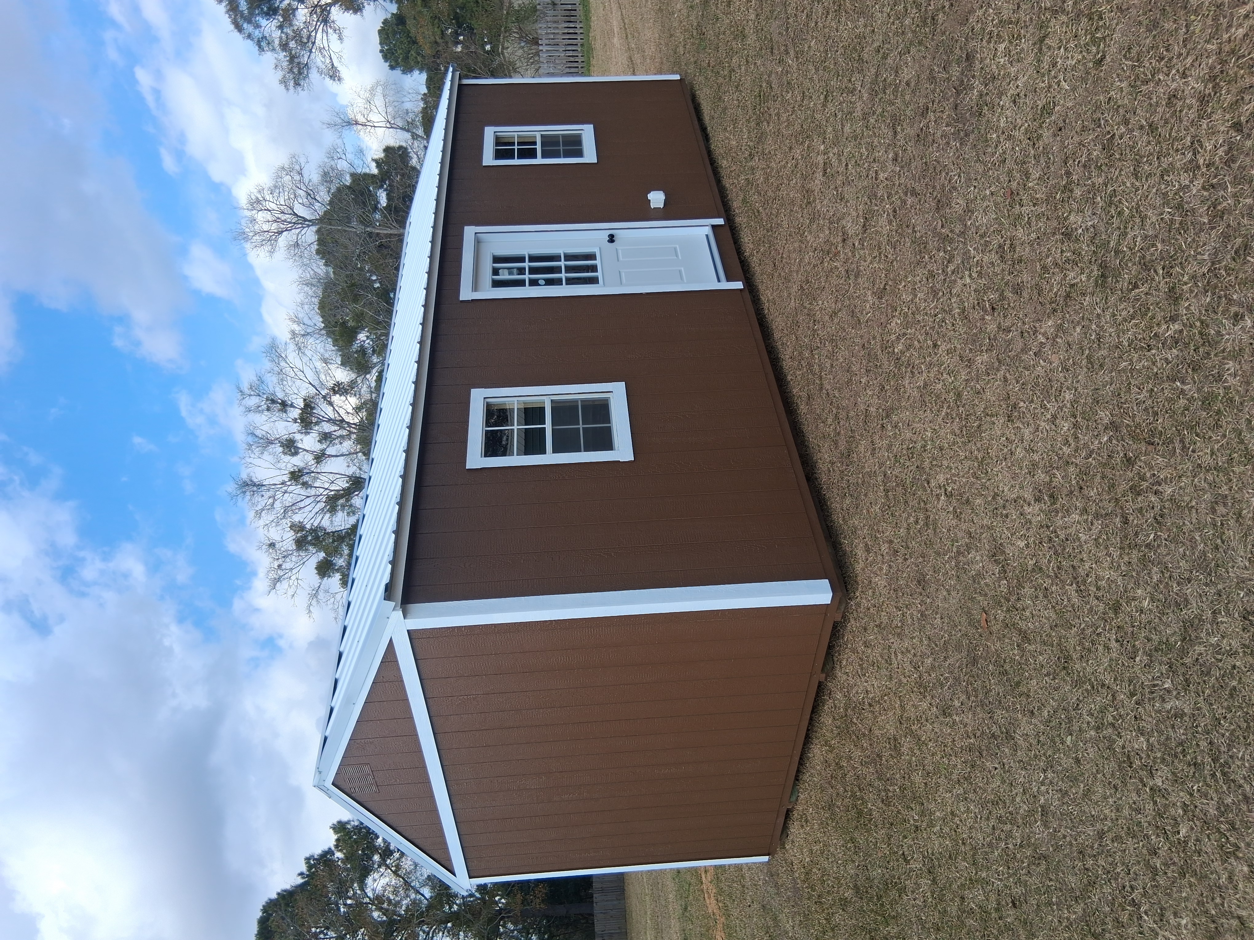 Portable shed with porch and double doors