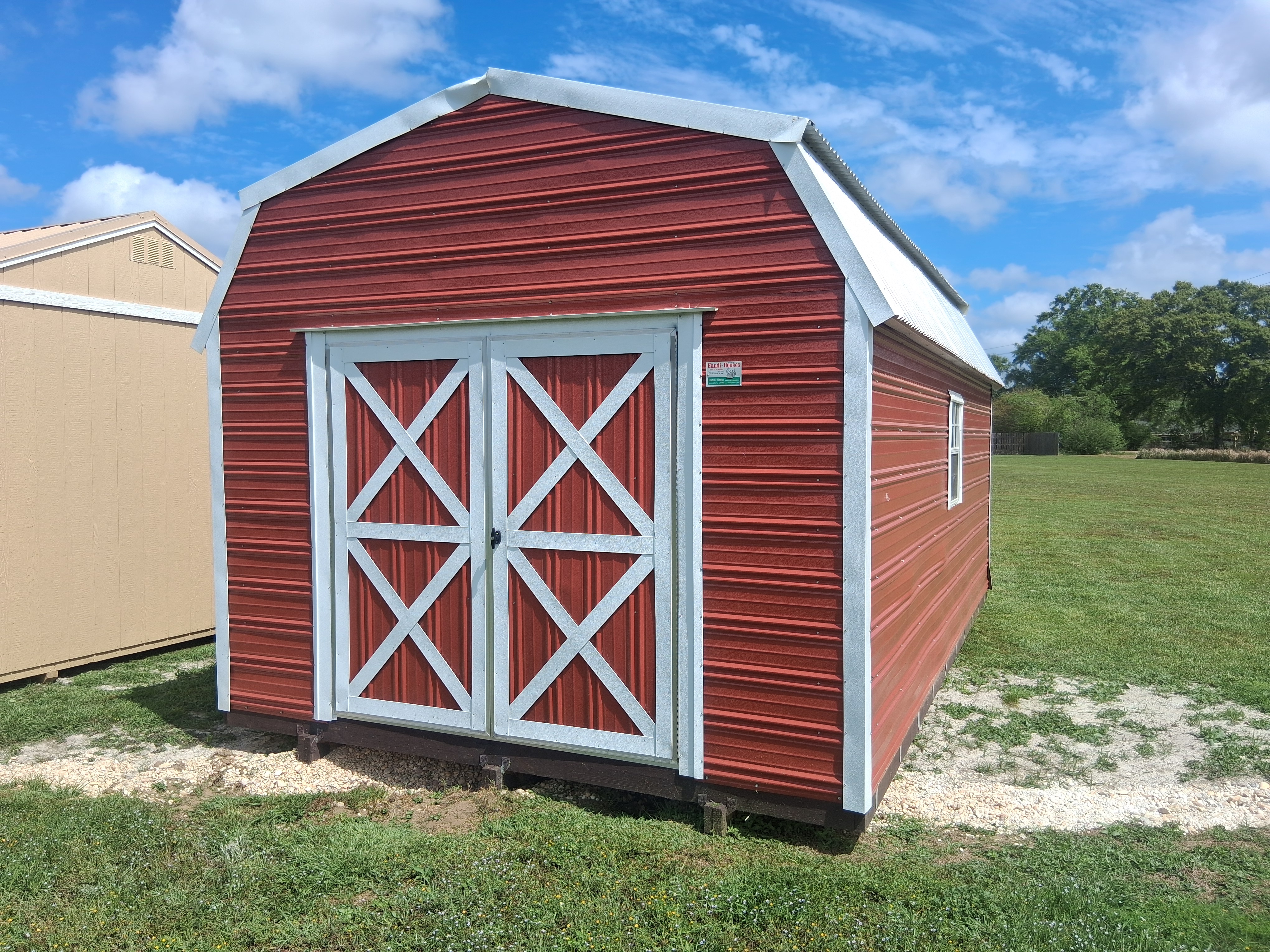 Red barn-style portable building